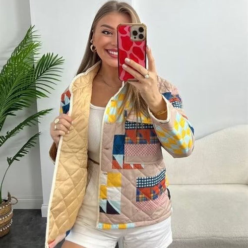 Quilted transitional jacket for women with a colorful patchwork pattern and large pockets Lune London