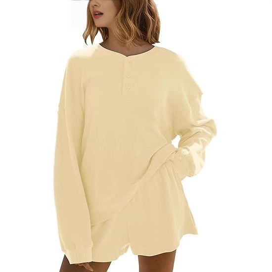 Dames loisirs t-shirt à manches longues pull avec détails de boutons Chic & Stil