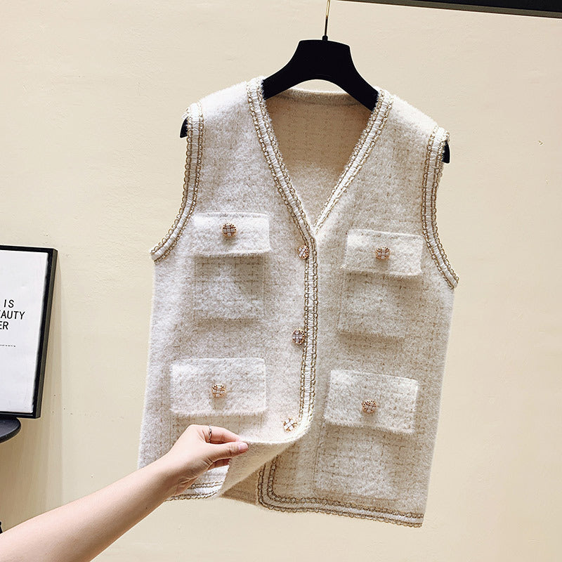 Gilet en tricot pour femmes avec boutons décoratifs et poches pratiques Chic & Stil