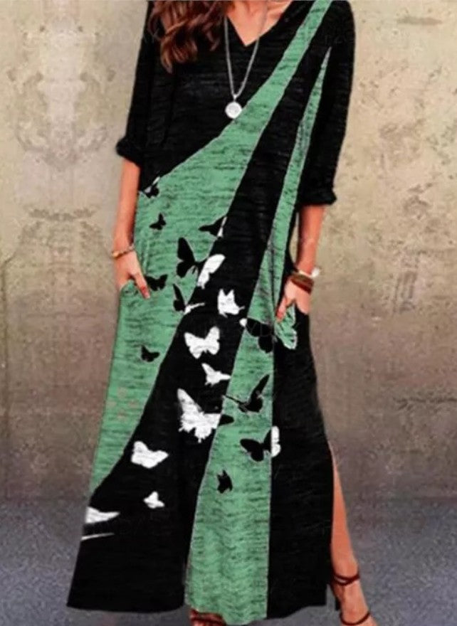 Maxi dress for women with an artistic butterfly design and practical pockets Lune London