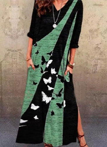 Maxi dress for women with an artistic butterfly design and practical pockets Lune London