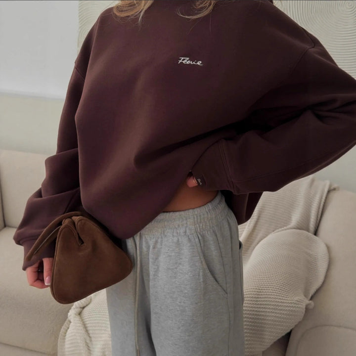 Pull décontracté surdimensionné pour femmes avec col rond et logo discret Chic & Stil
