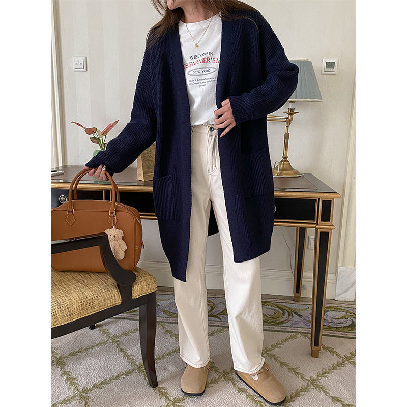 Women's cozy, lightweight knitted cardigan with two pockets Chic & Stil