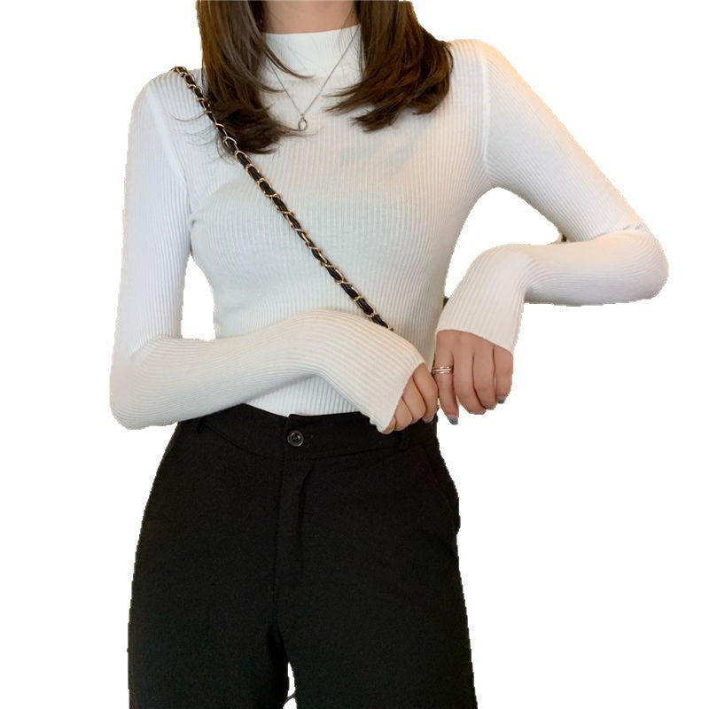 Pull à col roulé féminin à la mode en design tricot côtelé Chic & Stil
