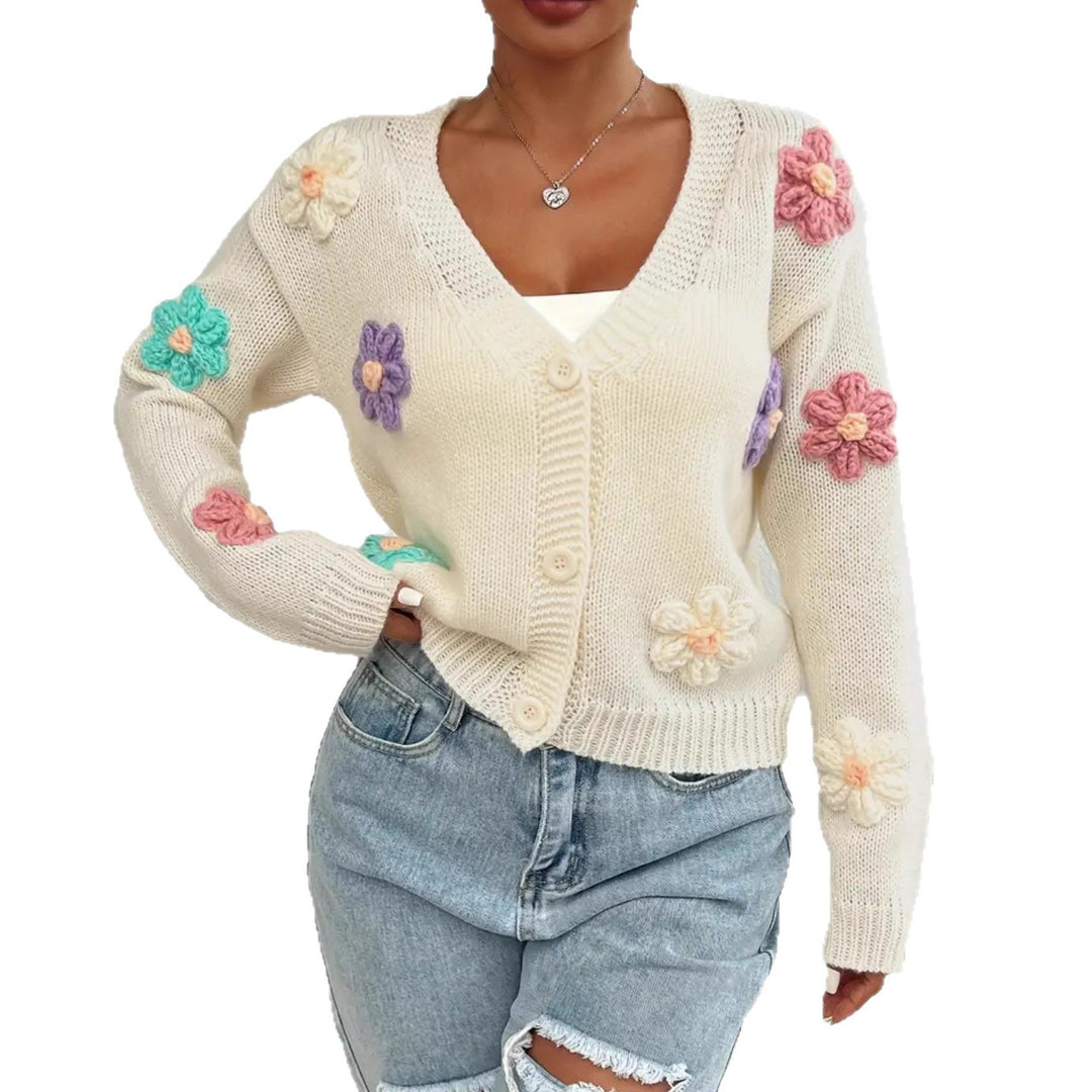 Ladies knit cardigan with hand-crocheted flower applications Lune London