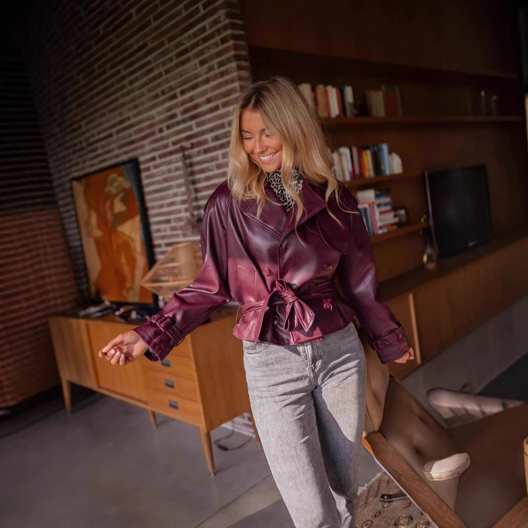 Short faux leather jacket for women with structured design and belted waist Lune London