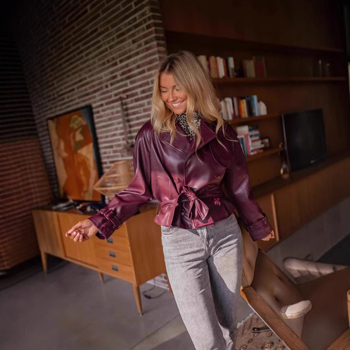 Short faux leather jacket for women with structured design and belted waist Lune London