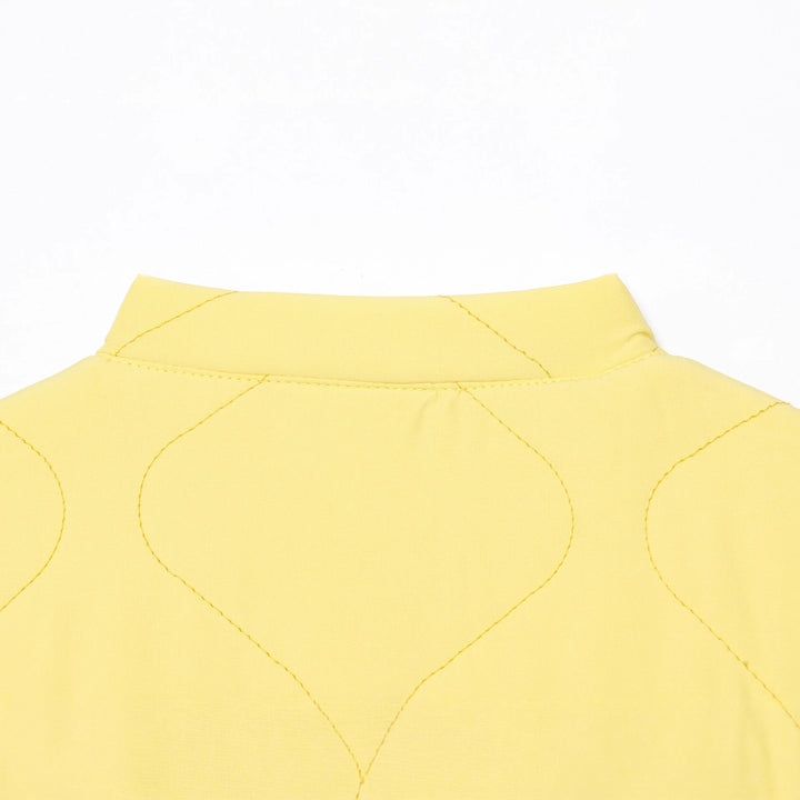 Quilted transition jacket for women with practical button closure and pockets Lune London