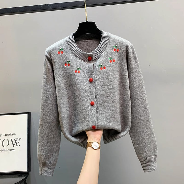 Ladies playful cardigan with embroidered cherries and red buttons Lune London