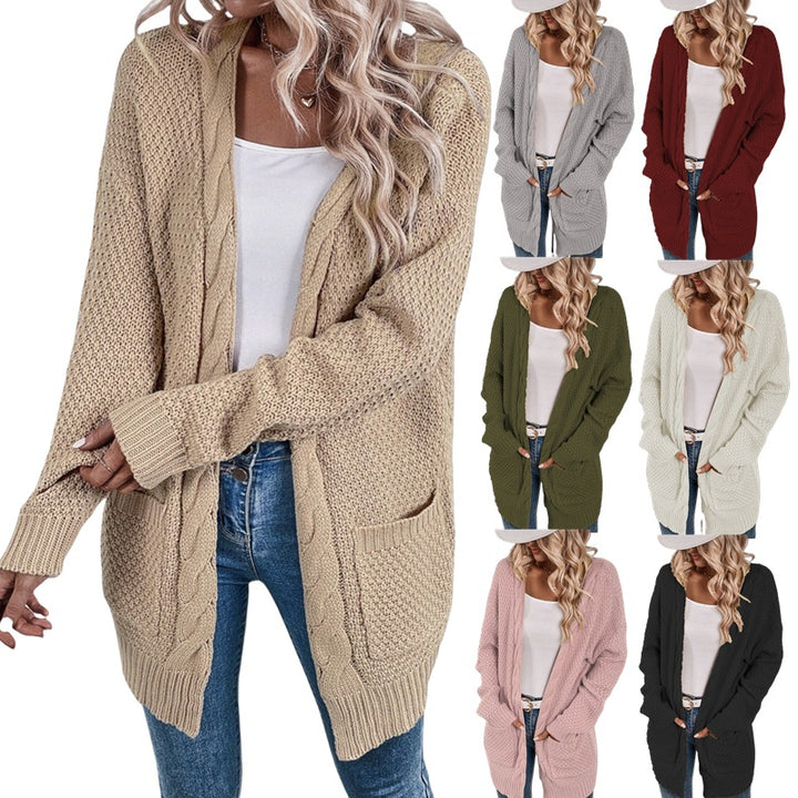 Ladies Large knitted cardigan with an elaborate stitch pattern and practical pockets Lune London
