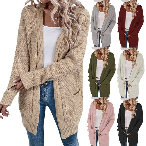 Ladies Large knitted cardigan with an elaborate stitch pattern and practical pockets Lune London