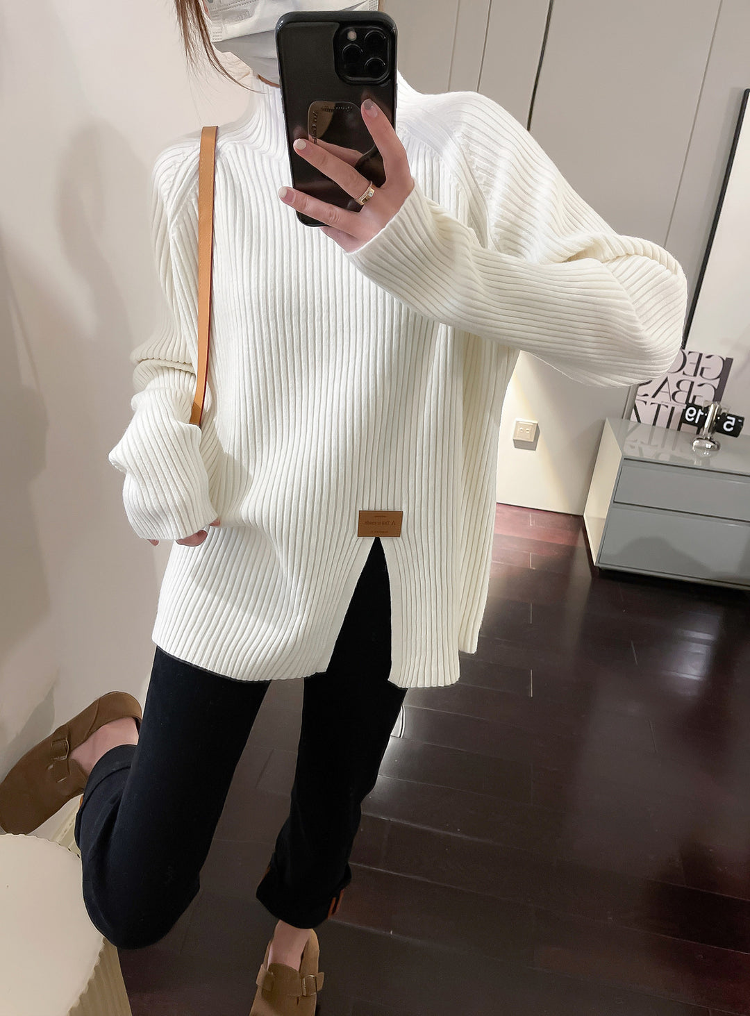 Ladies Modern Knit Sweater with High Collar and Chic Asymmetrical Cut