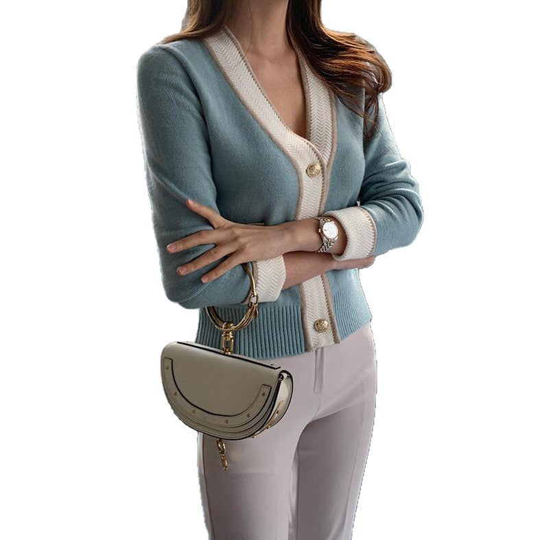 Gilet pour femmes avec des détails contrastés et une fermeture à bouton élégante Chic & Stil