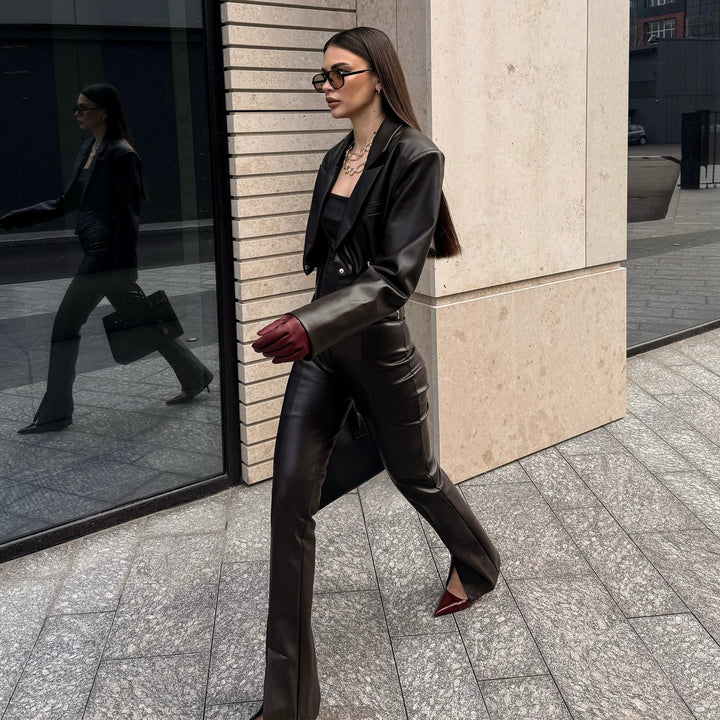 Elegant leather jacket for women with trendy blazer and slim pants