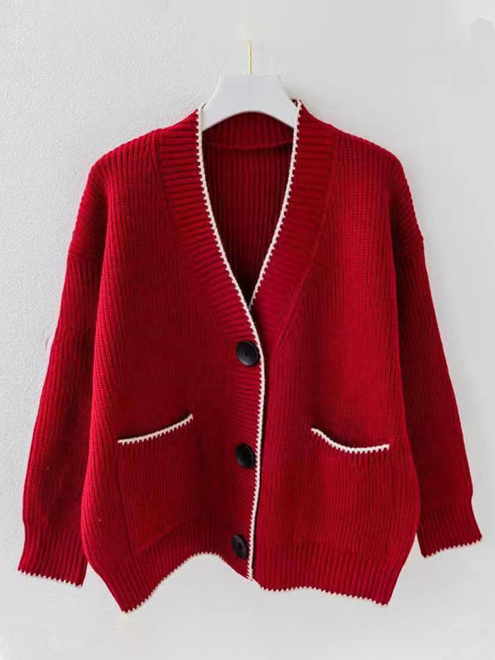 Ladies thick knit cardigan with deep V-neck and practical pockets Lune London