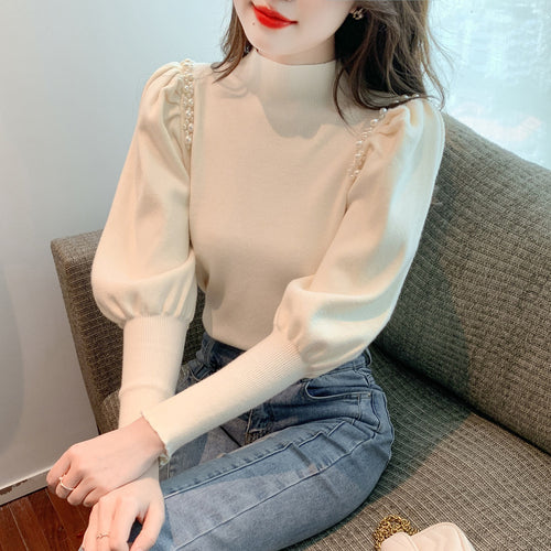 Elegant sweater for women with puff sleeves and pearl details Lune London