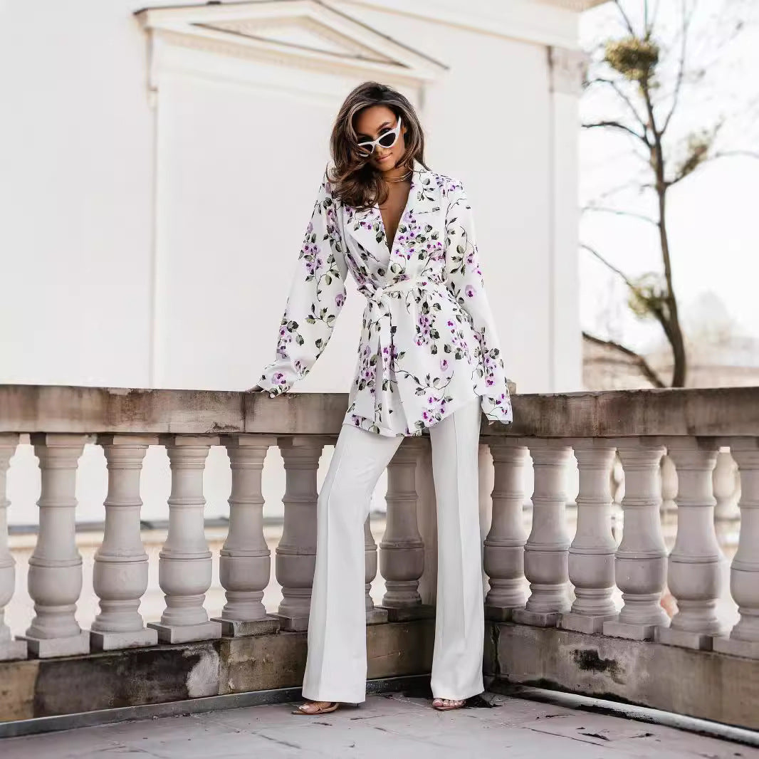 Wrap blouse for women with an elegant leopard pattern and long puff sleeves Lune London