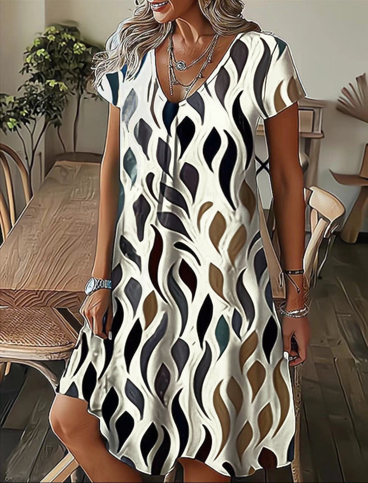 Fluid V-neck midi dress for women with abstract pattern Lune London