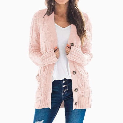 Knitted cardigan for women with cable pattern and practical pockets Lune London