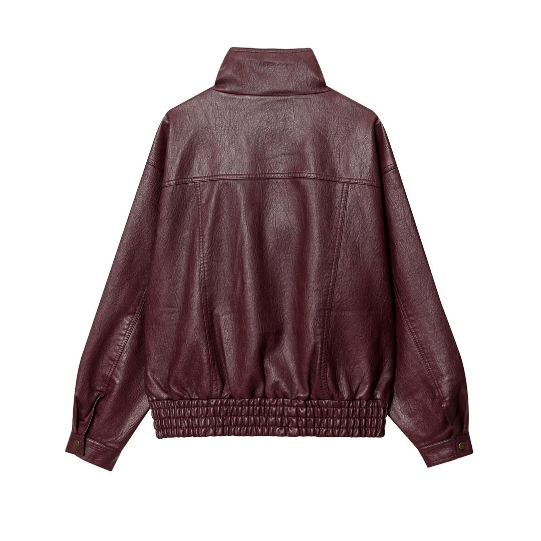 Women’s faux leather jacket with high collar and practical button details Lune London