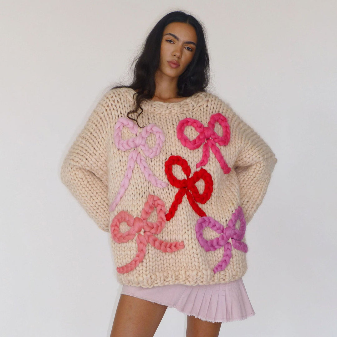 Chunky knit sweater for women with a playful knot design Lune London