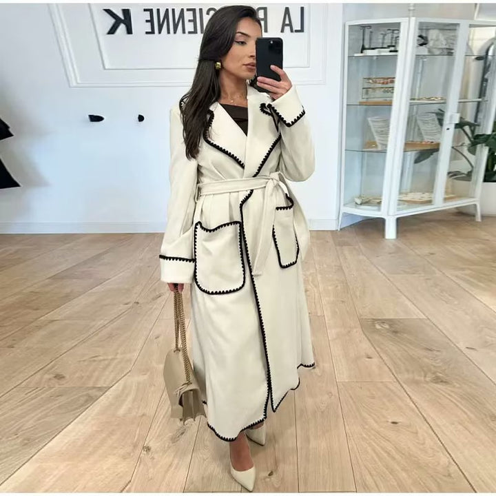 Elegant transitional jacket for women with decorative belt and high-quality pockets Lune London