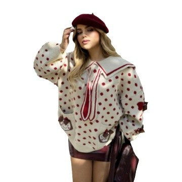 Chunky knit sweater for women with a unique neckline and chic feminine details