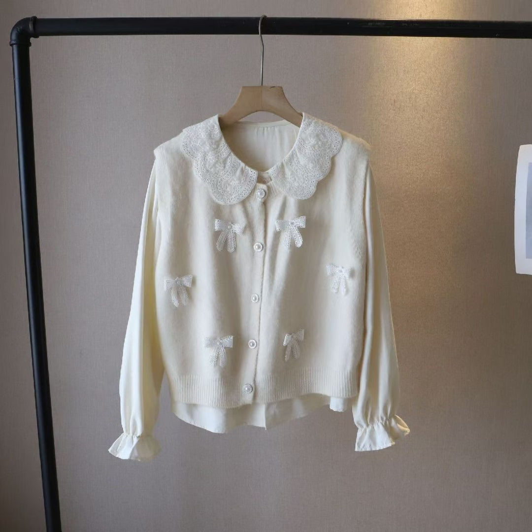 Ladies playful knit cardigan with rolled collar and decorative bows Lune London