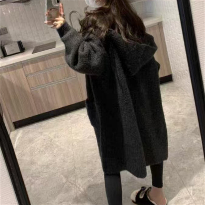 Long coat for women with an elegant ribbed structure and practical pockets Lune London
