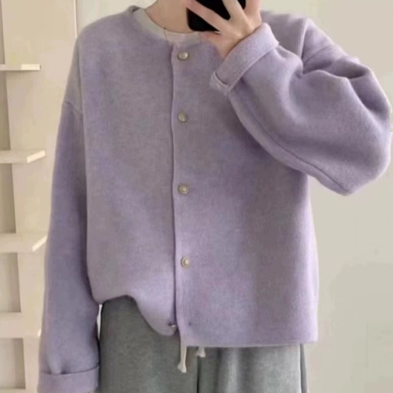 Women's chunky knit cardigan with elegant button placket and relaxed fit Lune London