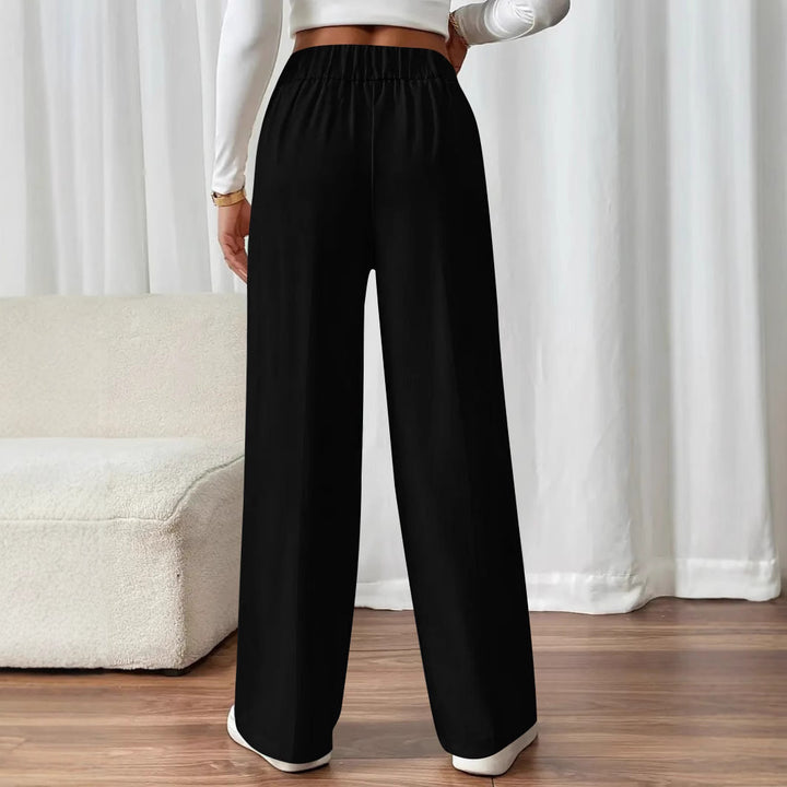 High-waisted flared pants for women with elegant button details Lune London