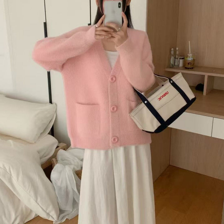 Cardigan pelucheux à boutons pour femmes avec poches élégantes Chic & Stil