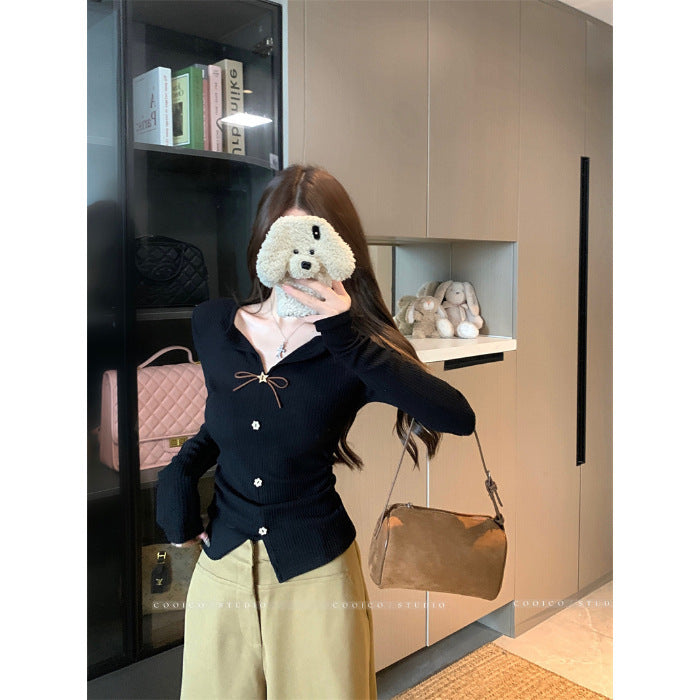 Ladies elegant knitted blouse with decorative tie strap Chic & Stil