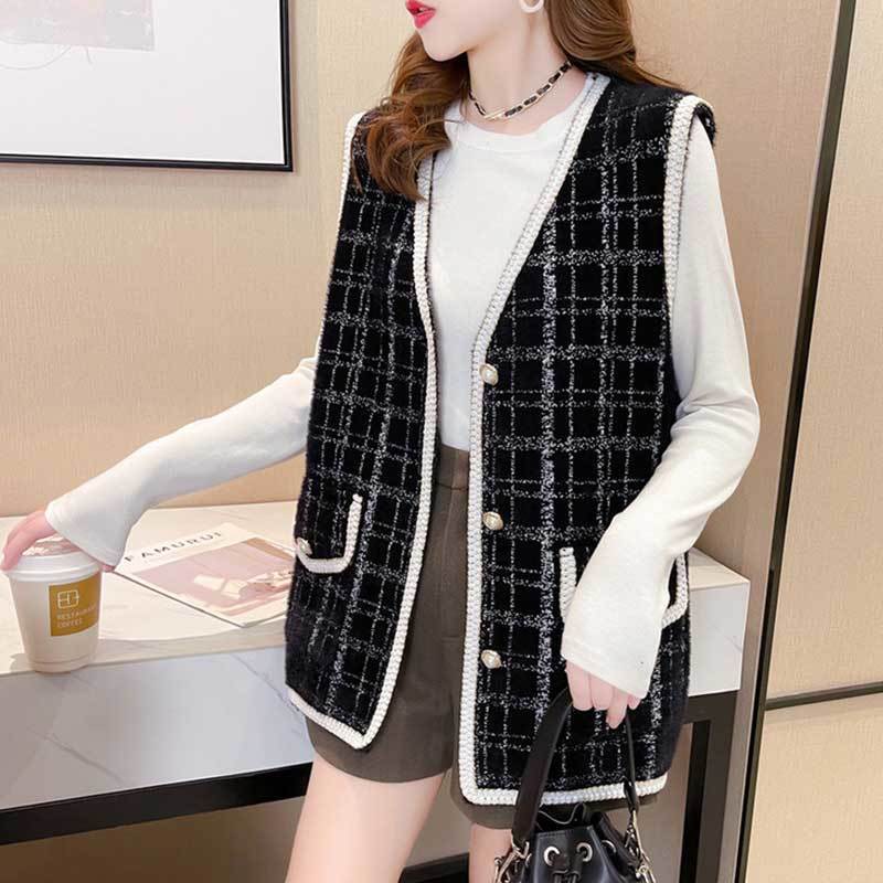 Gilet à la mode pour dames avec des détails de boutons décoratifs et un élégant motif à carreaux Chic & Stil