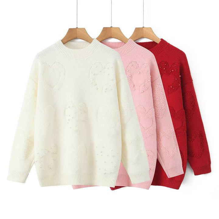 Pull en tricot confortable pour femmes avec motifs en cœur Chic & Stil