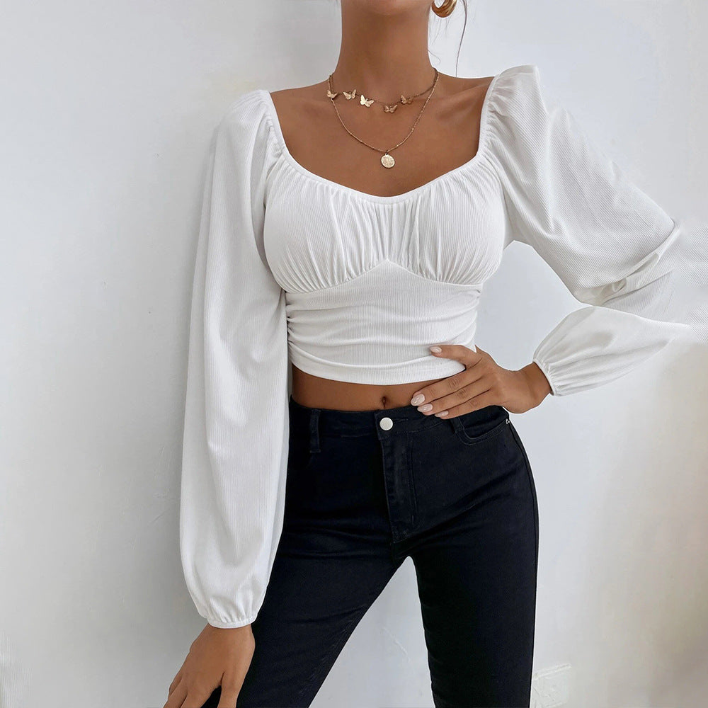Chic & Stil Elegant puff sleeve design women's crop top with fitted silhouette