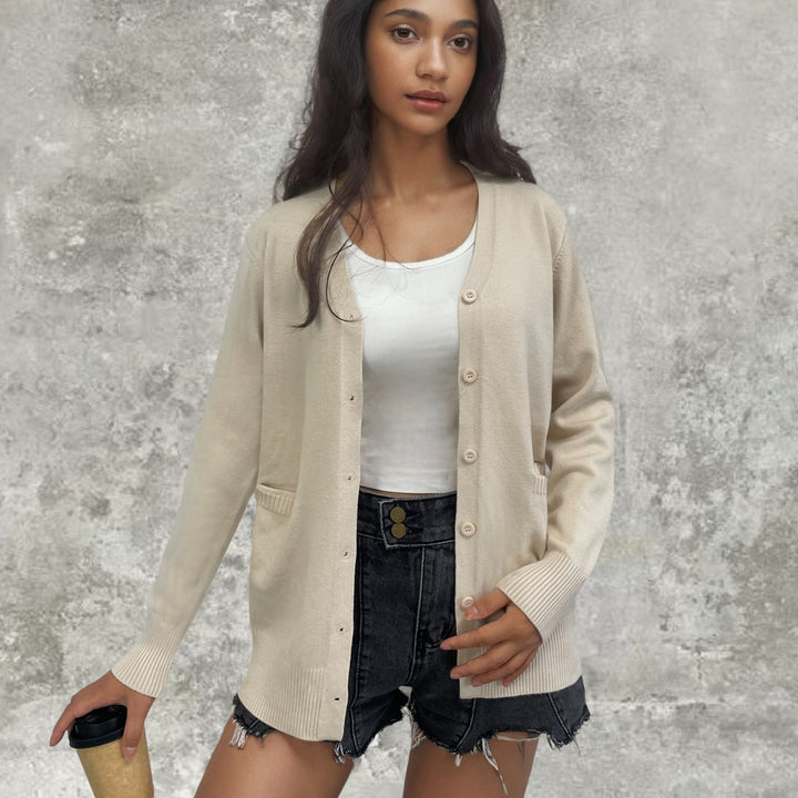 Elegant ladies knit vest with practical pockets and fine button placket Lune London