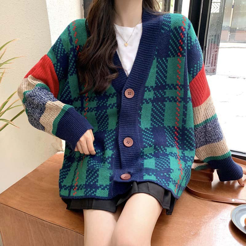 Ladies oversized knitted sweater with colorful checked pattern and large wooden buttons Lune London