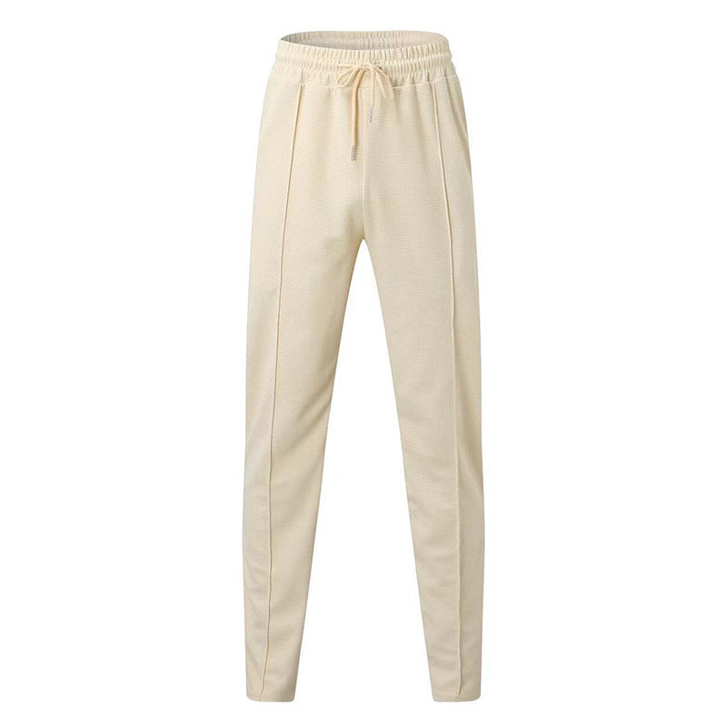 Sports jogger pants for men with elastic waistband and zip pockets Lune London