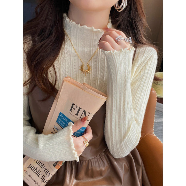 Pull femme à col roulé avec ourlet en vagues décoratif en tricot fin Chic & Stil