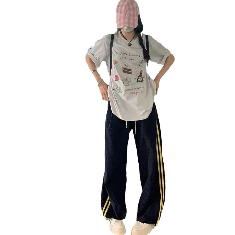 Women's casual sports pants with side stripes and elastic waistband