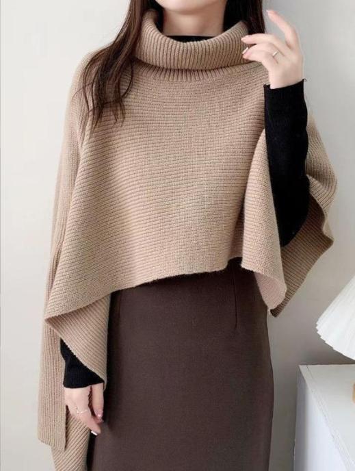 Ladies knitted poncho with high collar and asymmetrical cut Lune London