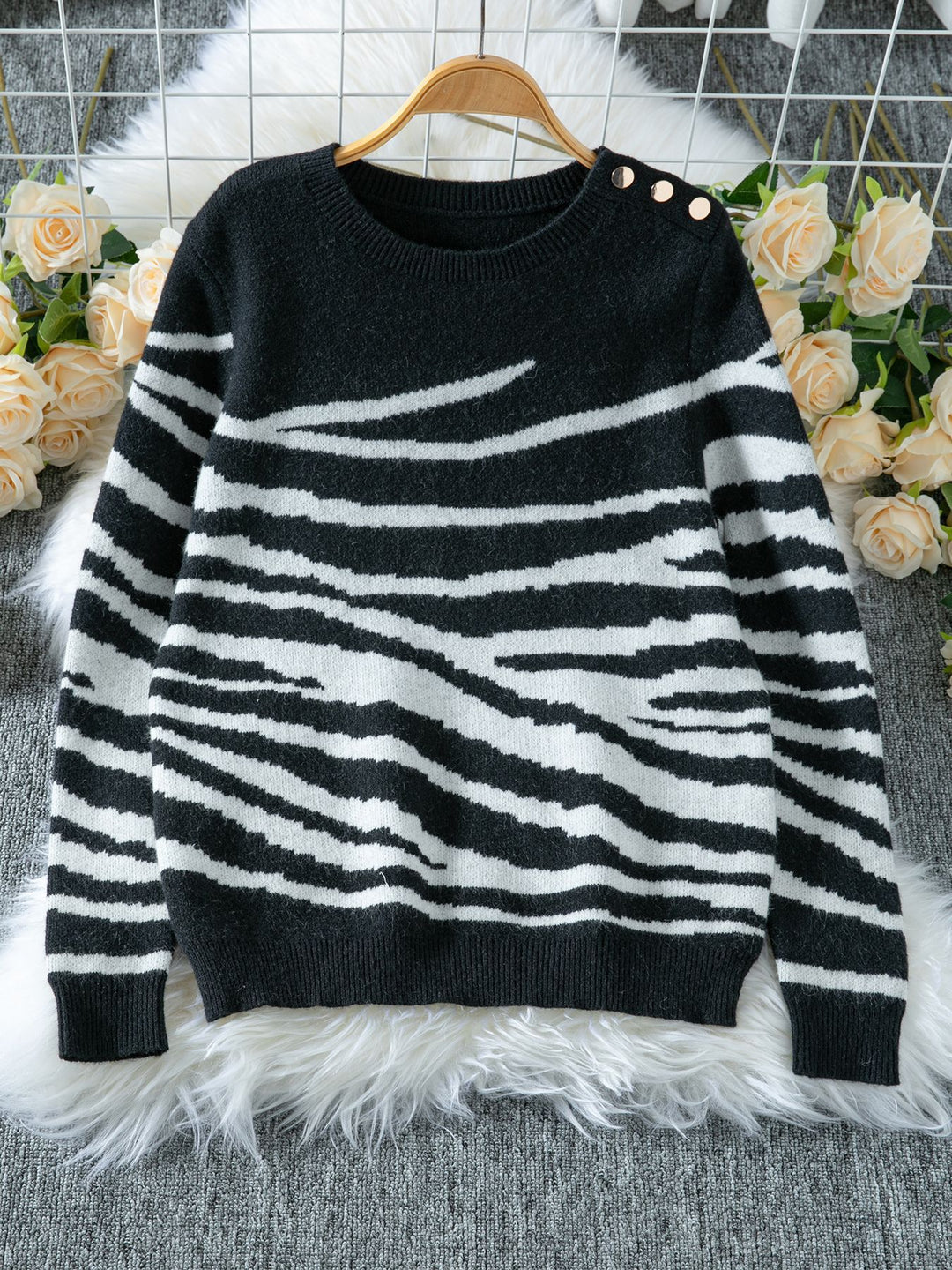 Comfortable knitted sweater for women with a modern zebra stripe pattern and a comfortable fit Lune London