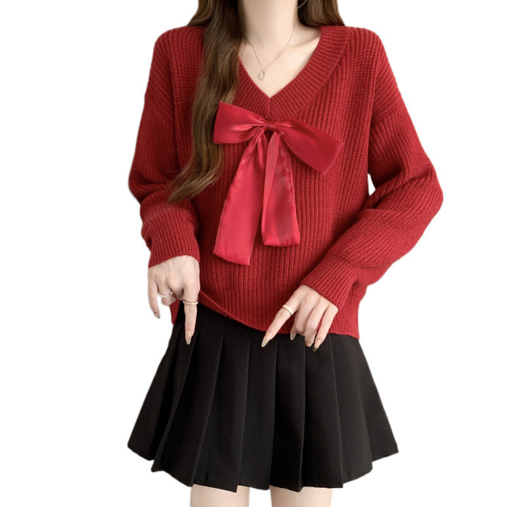 Knitted sweater for women with V-neck and decorative bow accent Lune London