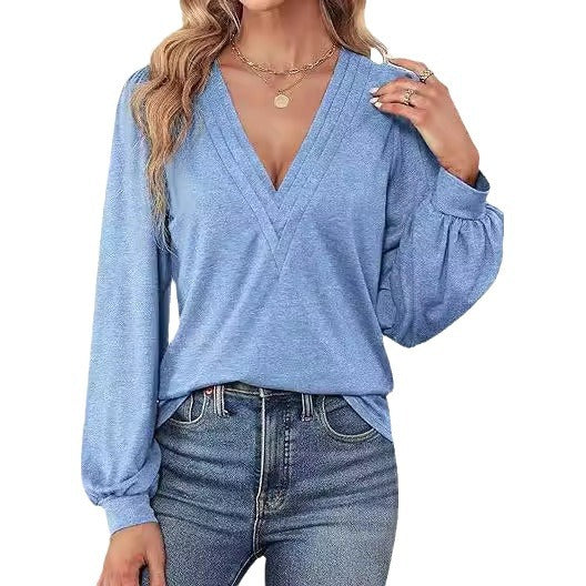 Elegant women's top with V neckline and puff sleeves Lune London