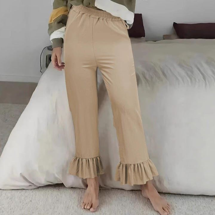 Women's flared pants with playful ruffle details Lune London