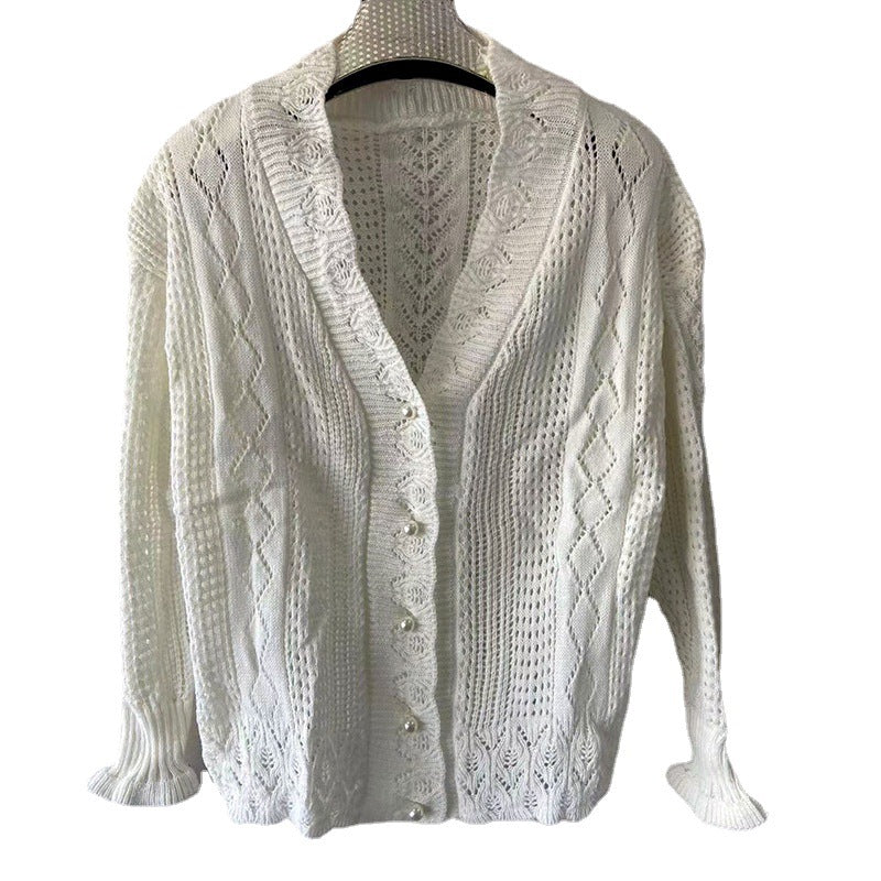 Casual knit jacket for women with an elegant cable pattern and large buttons Lune London