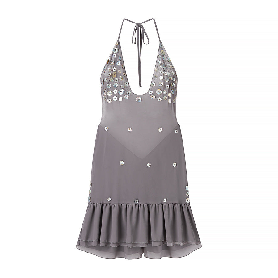 Summer dress for women with shimmering sequins and a voluminous hem Lune London