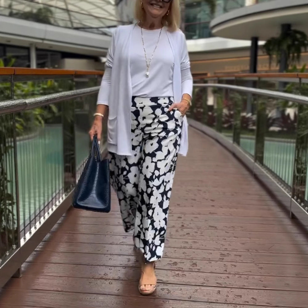 Pantalons d'été larges pour femmes avec motif floral et taille élastique Chic & Stil