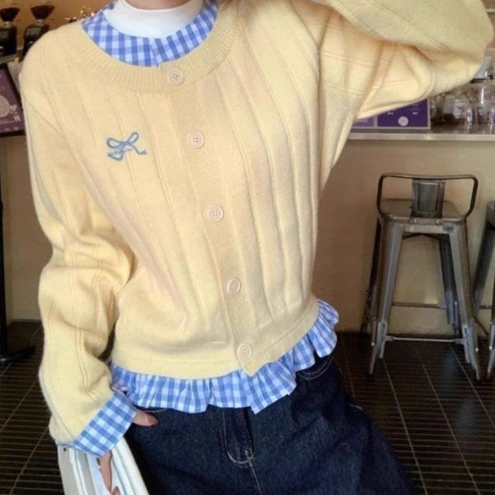 Trendy knit jacket for women with modern accents and a playful ruffle design Lune London